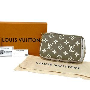NEW Louis Vuitton LV Monogram Empreinte Leather Mini Pochette Accessories Clutch